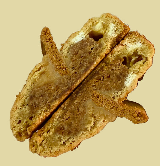 Thick, gooey cookie split in half, golden brown with creamy filling, Bake With Mimi dessert