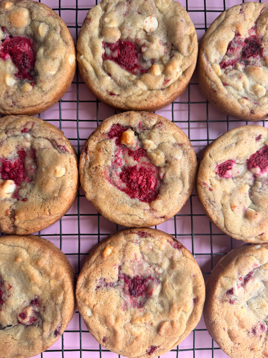 Freshly baked raspberry white chocolate cookies on cooling rack, Bake With Mimi bakery